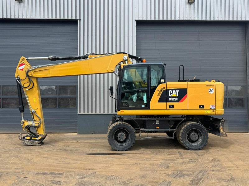 Caterpillar M320F - Pelle sur pneus: photos 1 Caterpillar M320F - Pelle sur pneus: photos 1
