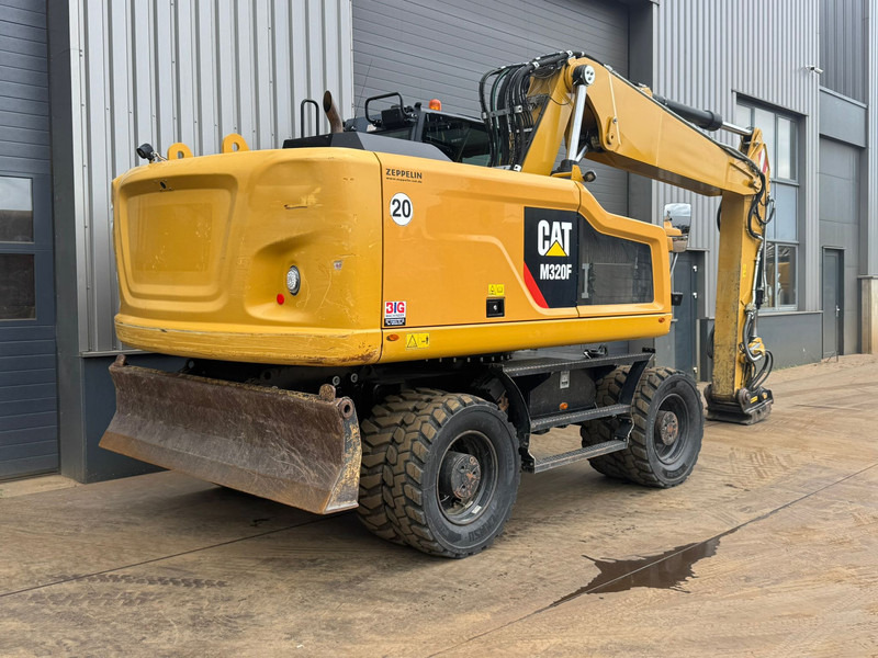 Caterpillar M320F - Pelle sur pneus: photos 5 Caterpillar M320F - Pelle sur pneus: photos 5