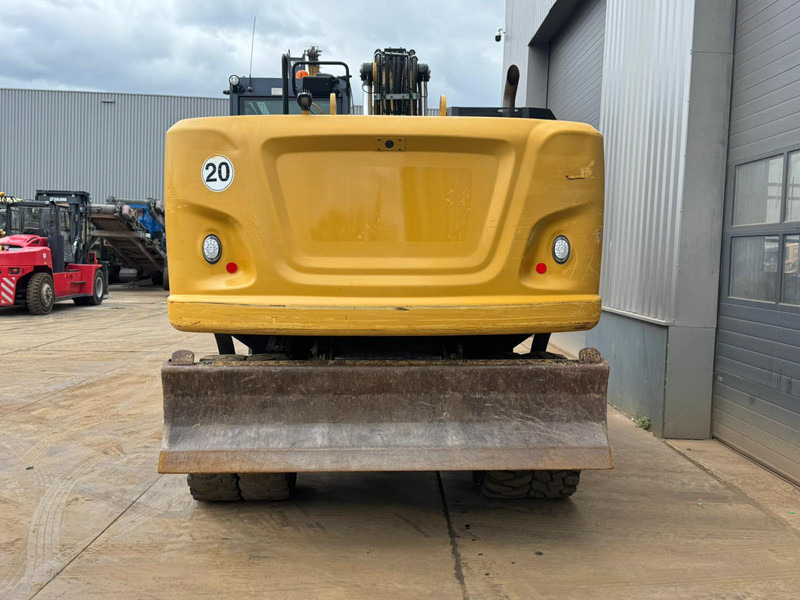 Caterpillar M320F - Pelle sur pneus: photos 4 Caterpillar M320F - Pelle sur pneus: photos 4