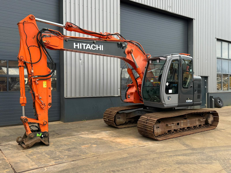 Hitachi ZX135US - Pelle sur chenille: photos 2 Hitachi ZX135US - Pelle sur chenille: photos 2