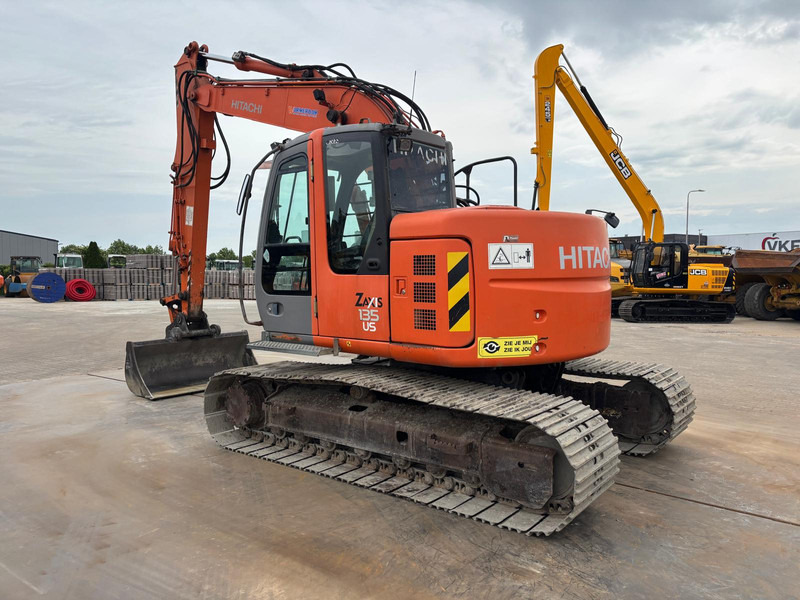 Hitachi ZX135US - Pelle: photos 1 Hitachi ZX135US - Pelle: photos 1