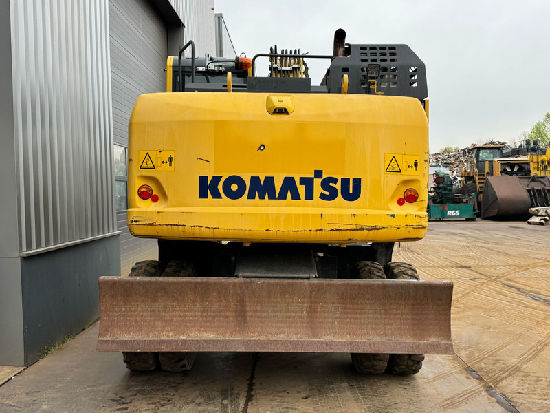 Komatsu PW180-11 - Pelle sur pneus: photos 4 Komatsu PW180-11 - Pelle sur pneus: photos 4