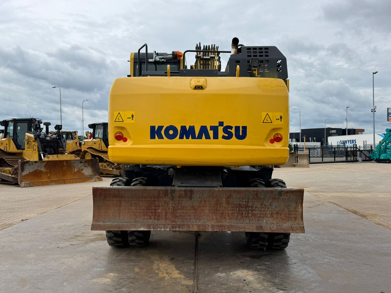 Komatsu PW180-11 - Pelle sur pneus: photos 4 Komatsu PW180-11 - Pelle sur pneus: photos 4