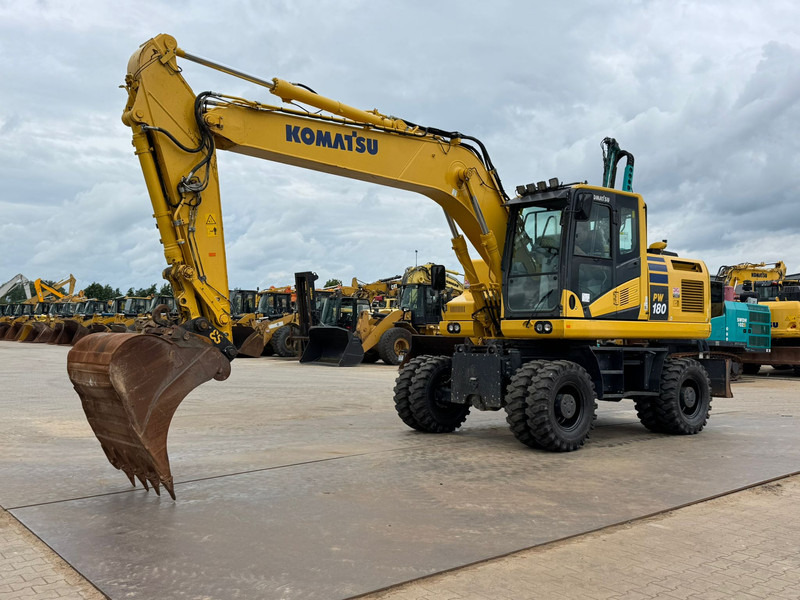 Komatsu PW180-11 - Pelle sur pneus: photos 2 Komatsu PW180-11 - Pelle sur pneus: photos 2