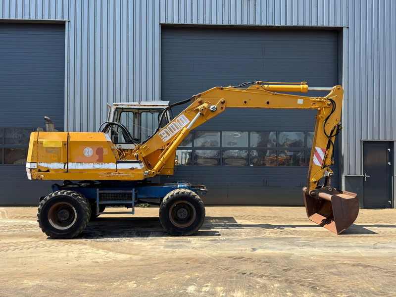 Liebherr A900C - Pelle sur pneus: photos 5 Liebherr A900C - Pelle sur pneus: photos 5