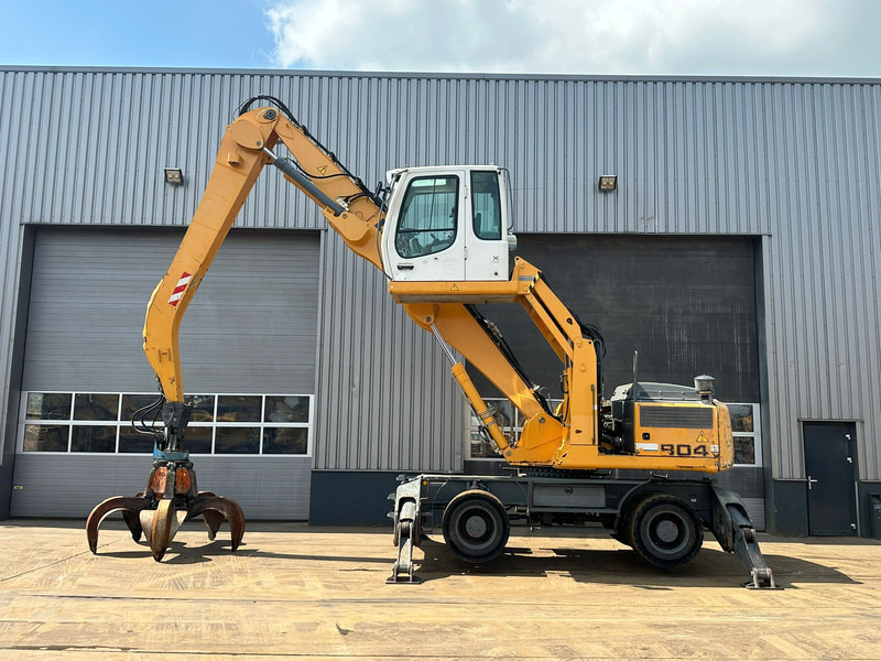 Liebherr A904C - Material Handler - Pelle de manutention: photos 1 Liebherr A904C - Material Handler - Pelle de manutention: photos 1