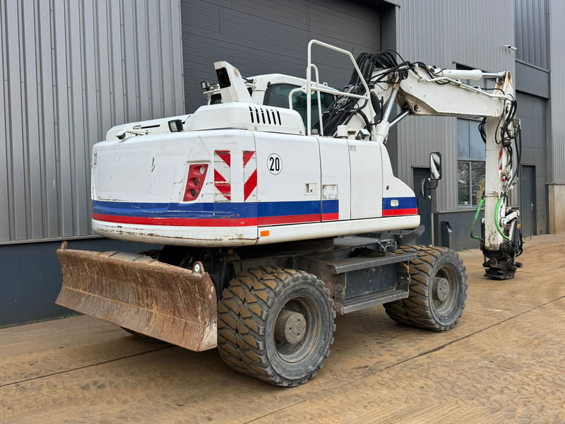 Volvo EW160D - Pelle sur pneus: photos 5 Volvo EW160D - Pelle sur pneus: photos 5