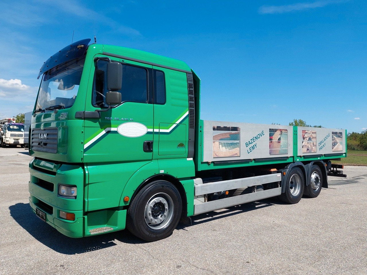 MAN TGA 26.430 LL 6x2-2 - Camion plateau: photos 1 MAN TGA 26.430 LL 6x2-2 - Camion plateau: photos 1