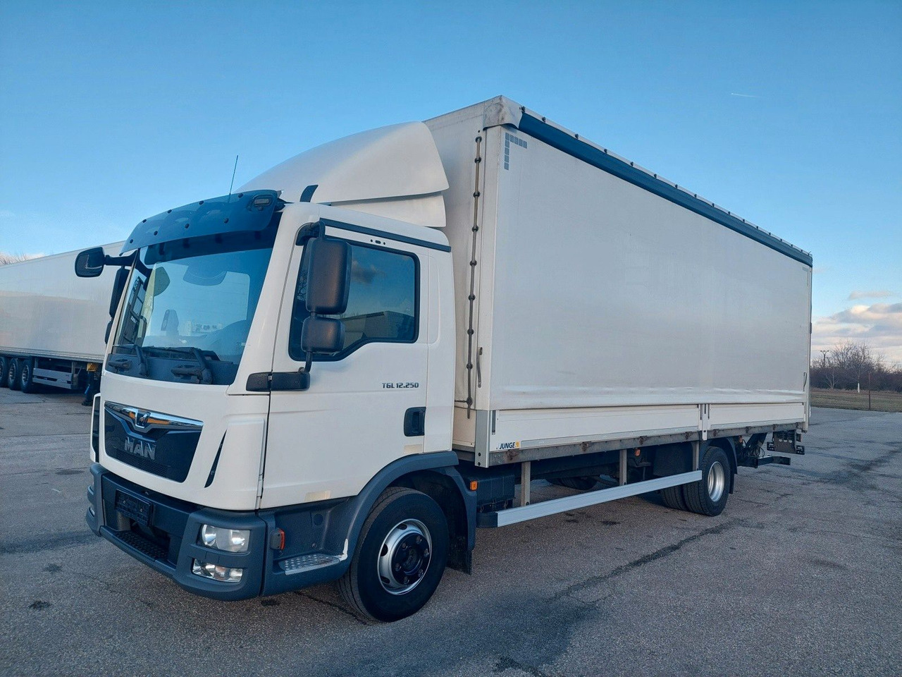 MAN TGL 12.250 BL 4x2 Edscha L 7,28 m - Camion à rideaux coulissants: photos 1 MAN TGL 12.250 BL 4x2 Edscha L 7,28 m - Camion à rideaux coulissants: photos 1