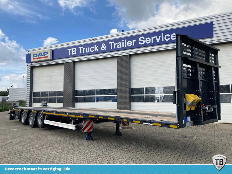 Kässbohrer SPS HM 3 / 0N - 18 / 27 Vlakke mega trailer met liftas, 18x rongen en kist voor de oprijplaten - Semi-remorque plateau: photos 1 Kässbohrer SPS HM 3 / 0N - 18 / 27 Vlakke mega trailer met liftas, 18x rongen en kist voor de oprijplaten - Semi-remorque plateau: photos 1