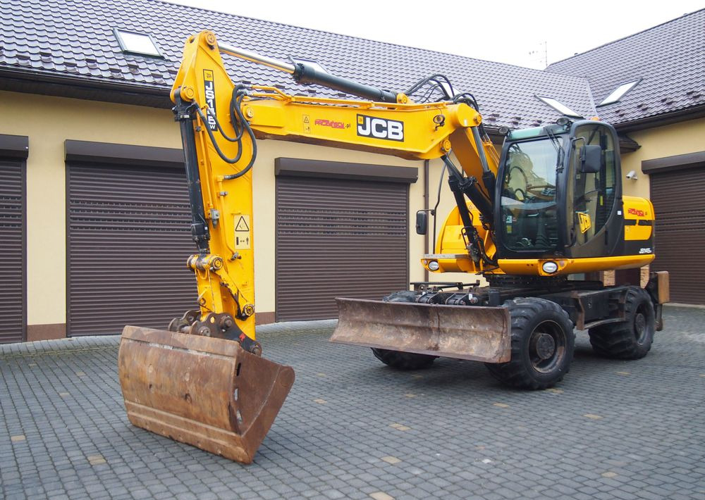 Koparka kołowa JCB JS145W 2011 Koparka JCB - Pelle sur pneus: photos 3 Koparka kołowa JCB JS145W 2011 Koparka JCB - Pelle sur pneus: photos 3