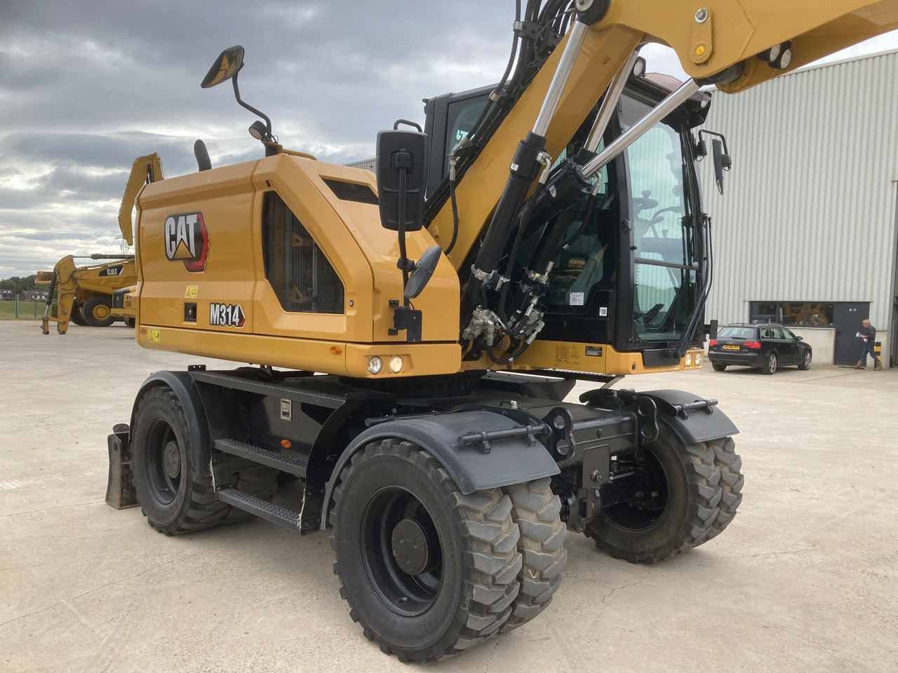 CATERPILLAR M314 - Pelle sur pneus: photos 5 CATERPILLAR M314 - Pelle sur pneus: photos 5