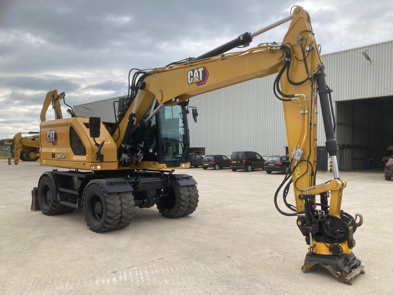 CATERPILLAR M314 - Pelle sur pneus: photos 4 CATERPILLAR M314 - Pelle sur pneus: photos 4