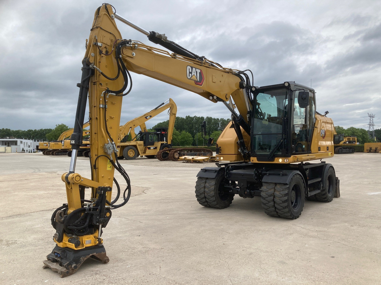 CATERPILLAR M314 - Pelle sur pneus: photos 3 CATERPILLAR M314 - Pelle sur pneus: photos 3