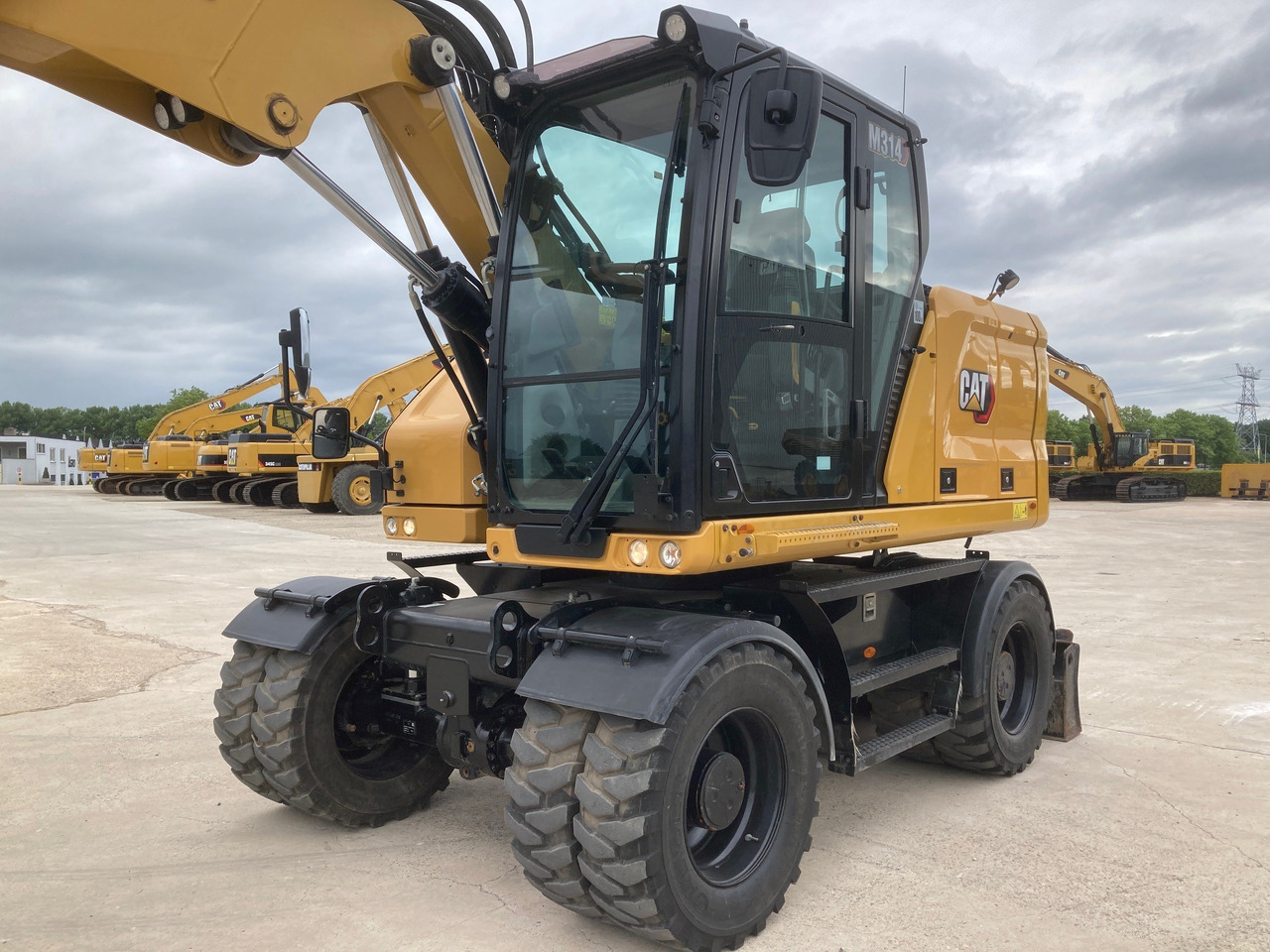 CATERPILLAR M314 - Pelle sur pneus: photos 2 CATERPILLAR M314 - Pelle sur pneus: photos 2