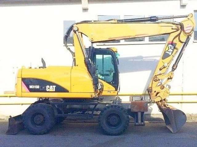 Caterpillar M 315 D - Pelle sur pneus: photos 1 Caterpillar M 315 D - Pelle sur pneus: photos 1