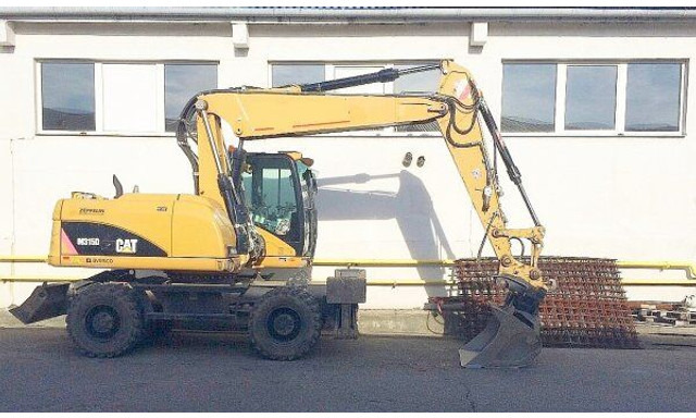 Caterpillar M 315 D - Pelle sur pneus: photos 2 Caterpillar M 315 D - Pelle sur pneus: photos 2