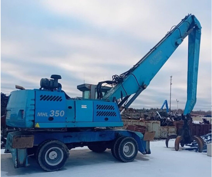 Fuchs MHL350 - Pelle de manutention: photos 1 Fuchs MHL350 - Pelle de manutention: photos 1