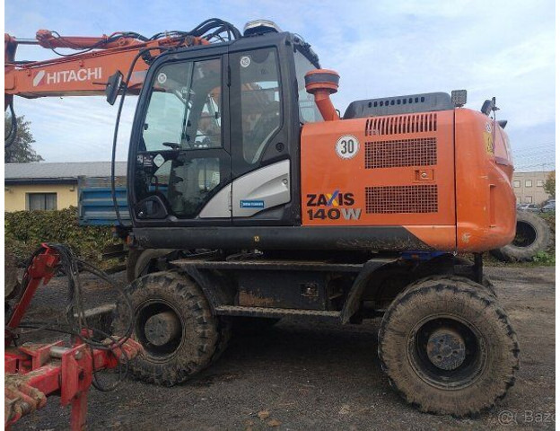 Hitachi Zaxis 140W-5B - Pelle sur pneus: photos 1 Hitachi Zaxis 140W-5B - Pelle sur pneus: photos 1