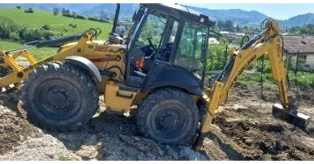 New Holland B115B - Tractopelle: photos 3 New Holland B115B - Tractopelle: photos 3