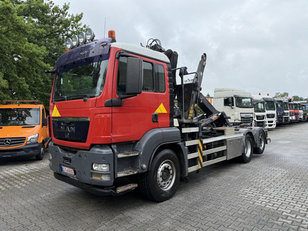 MAN TGS 26.360 6X2 Haken mit Kran HMF 1643Z - Camion ampliroll, Camion grue: photos 1 MAN TGS 26.360 6X2 Haken mit Kran HMF 1643Z - Camion ampliroll, Camion grue: photos 1