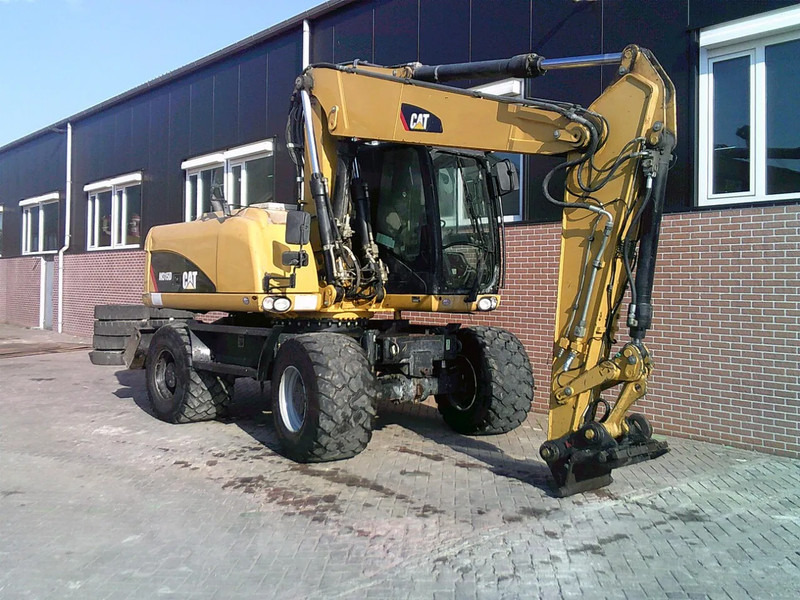 Caterpillar M315D - Pelle sur pneus: photos 4 Caterpillar M315D - Pelle sur pneus: photos 4