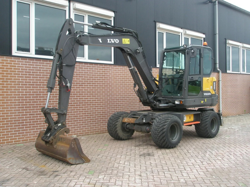 Volvo EW60E - Pelle sur pneus: photos 1 Volvo EW60E - Pelle sur pneus: photos 1