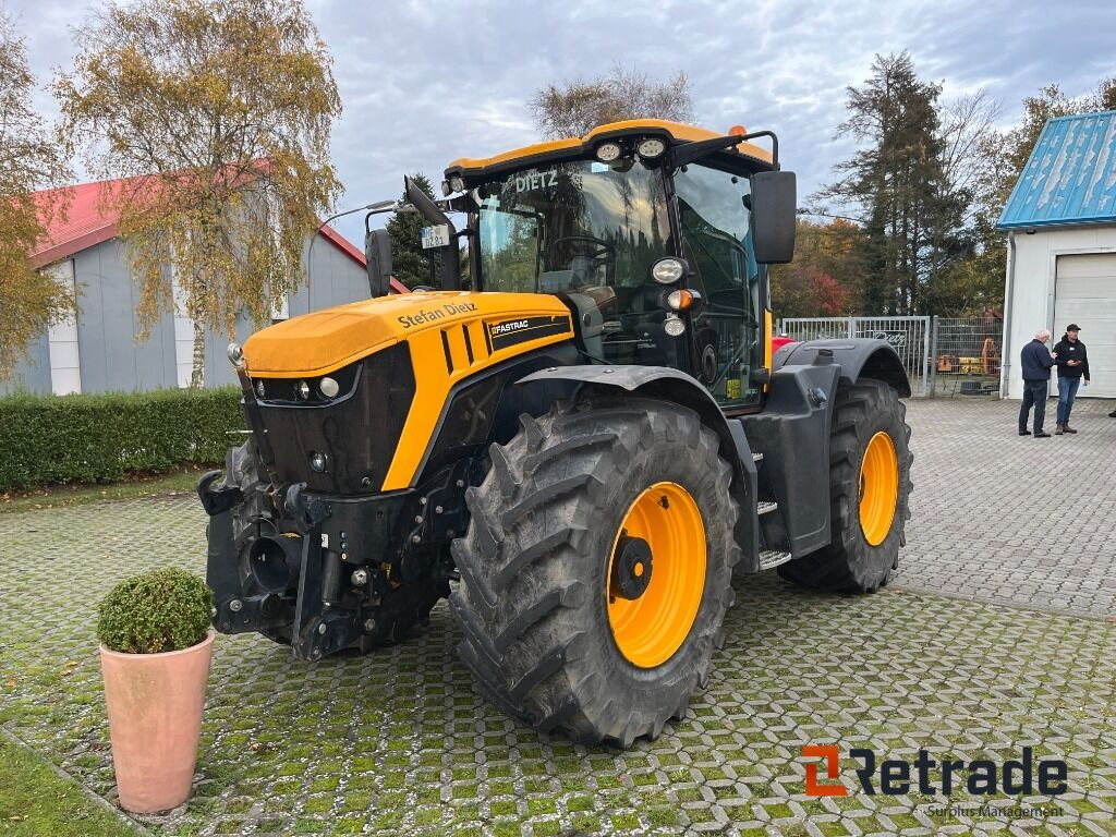 Traktor JCB Fasttrac 4220 serie 4 - Tracteur agricole: photos 1 Traktor JCB Fasttrac 4220 serie 4 - Tracteur agricole: photos 1