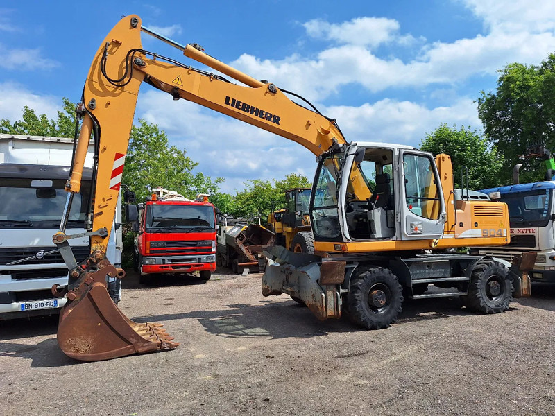 Liebherr A904C - Pelle sur pneus: photos 1 Liebherr A904C - Pelle sur pneus: photos 1