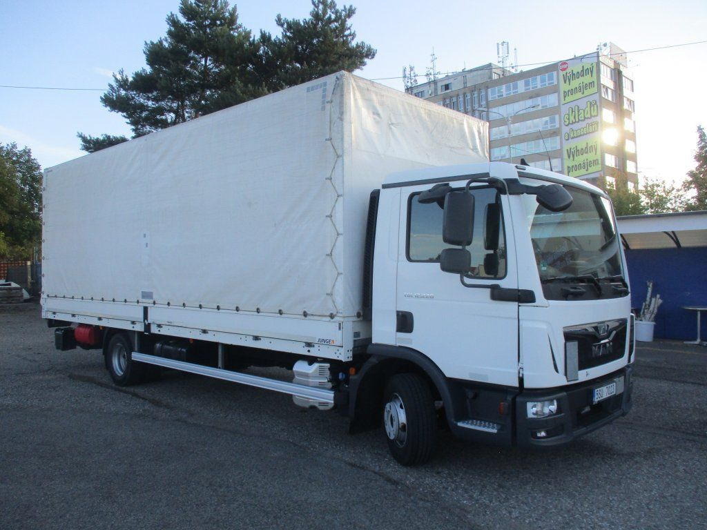 MAN TGL 12.220 - Camion à rideaux coulissants: photos 2 MAN TGL 12.220 - Camion à rideaux coulissants: photos 2