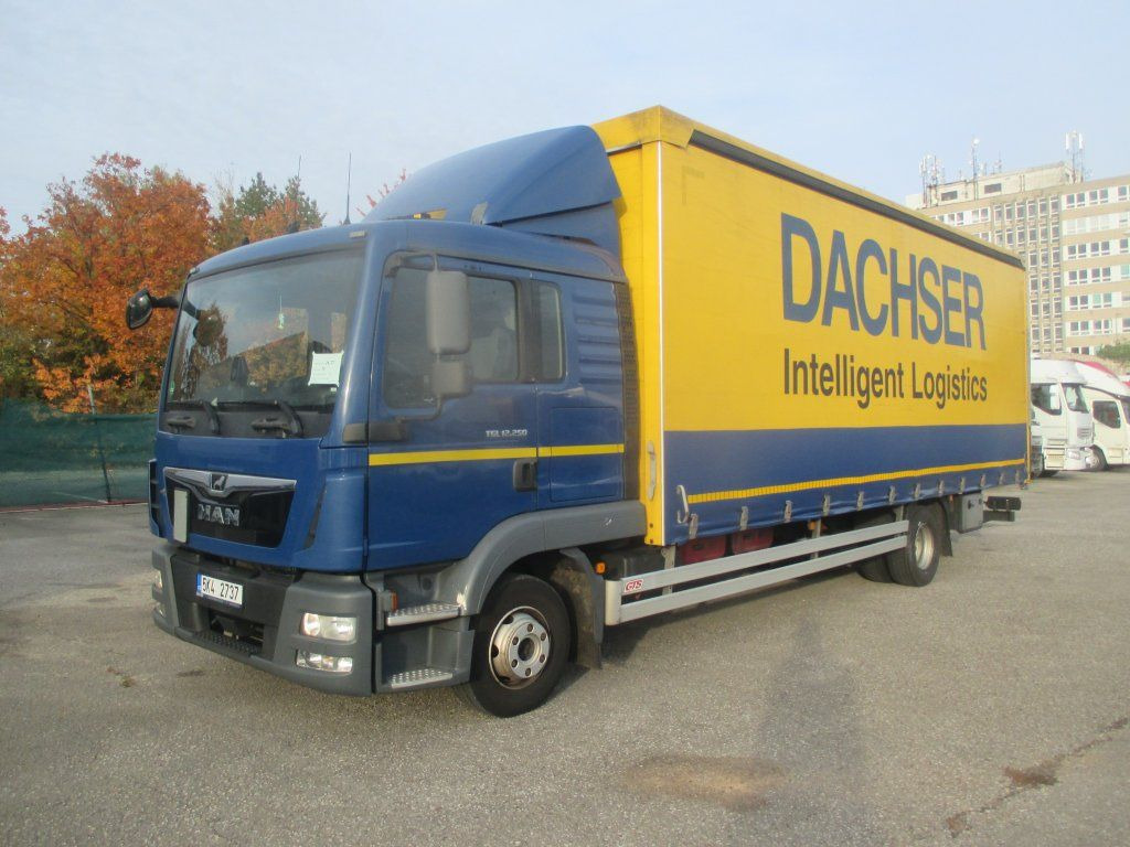 MAN TGL 12.250 - Camion à rideaux coulissants: photos 1 MAN TGL 12.250 - Camion à rideaux coulissants: photos 1