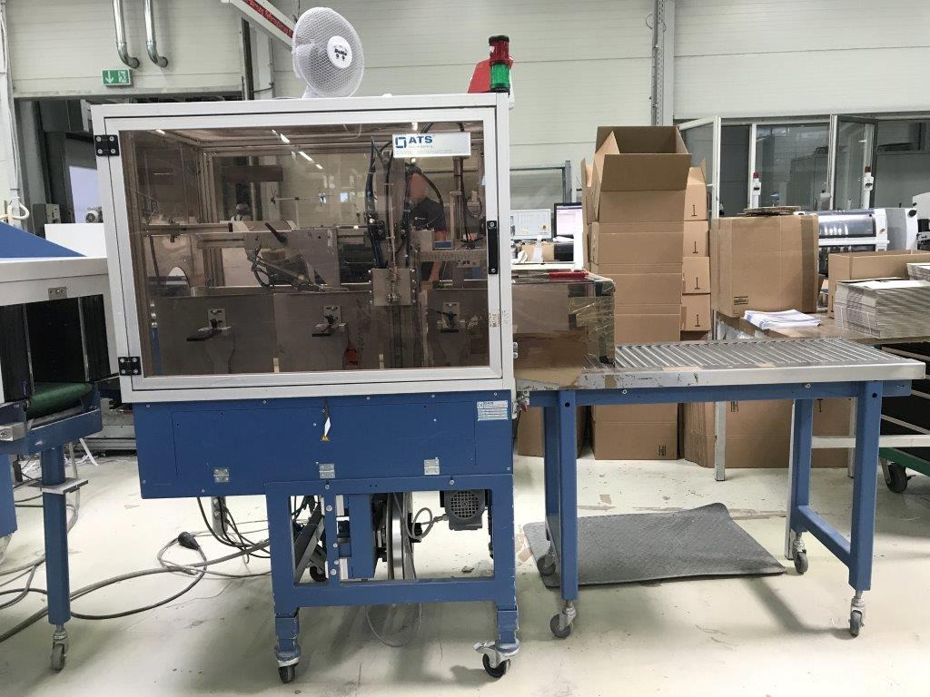 ATS Tanner US 2000 TRS-L banding machine - Machine d'emballage et de conditionnement: photos 1 ATS Tanner US 2000 TRS-L banding machine - Machine d'emballage et de conditionnement: photos 1
