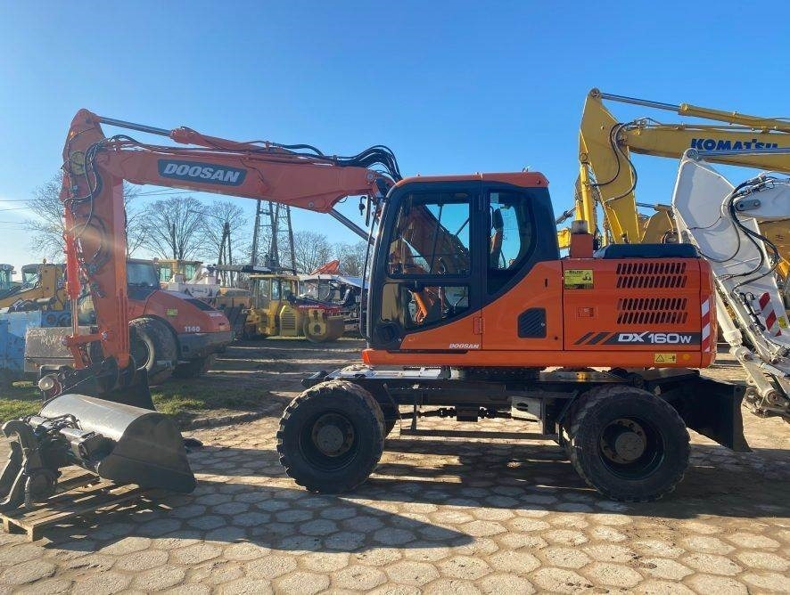 Doosan DX160W-3 - Pelle sur pneus: photos 3 Doosan DX160W-3 - Pelle sur pneus: photos 3