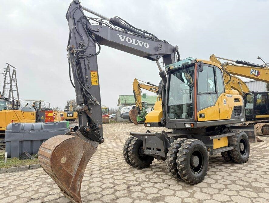 Volvo EW140D - Pelle sur pneus: photos 3 Volvo EW140D - Pelle sur pneus: photos 3