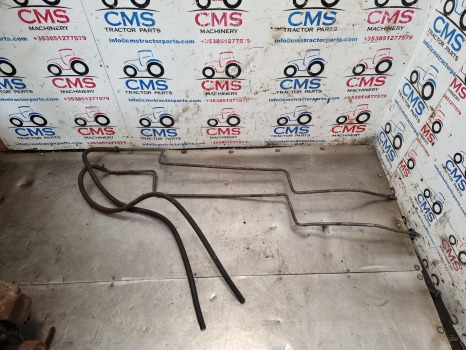 Ford 8340, 7840, 8240, Transmission Oil Cooler Pipes, Tubes 82006300, 82016764 - Radiateur: photos 1 Ford 8340, 7840, 8240, Transmission Oil Cooler Pipes, Tubes 82006300, 82016764 - Radiateur: photos 1