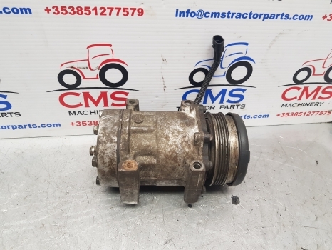 New Holland Case T6, T6000, T7, Puma T7.200 Air Conditioning Compressor 87709785 - Compresseur de climatisation pour Tracteur agricole: photos 1 New Holland Case T6, T6000, T7, Puma T7.200 Air Conditioning Compressor 87709785 - Compresseur de climatisation pour Tracteur agricole: photos 1
