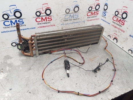 New Holland Case T6, T7, Maxxum, Puma Heater Radiator, Valve 4118453, 82037666 - Chauffage/ Ventilation pour Tracteur agricole: photos 1 New Holland Case T6, T7, Maxxum, Puma Heater Radiator, Valve 4118453, 82037666 - Chauffage/ Ventilation pour Tracteur agricole: photos 1