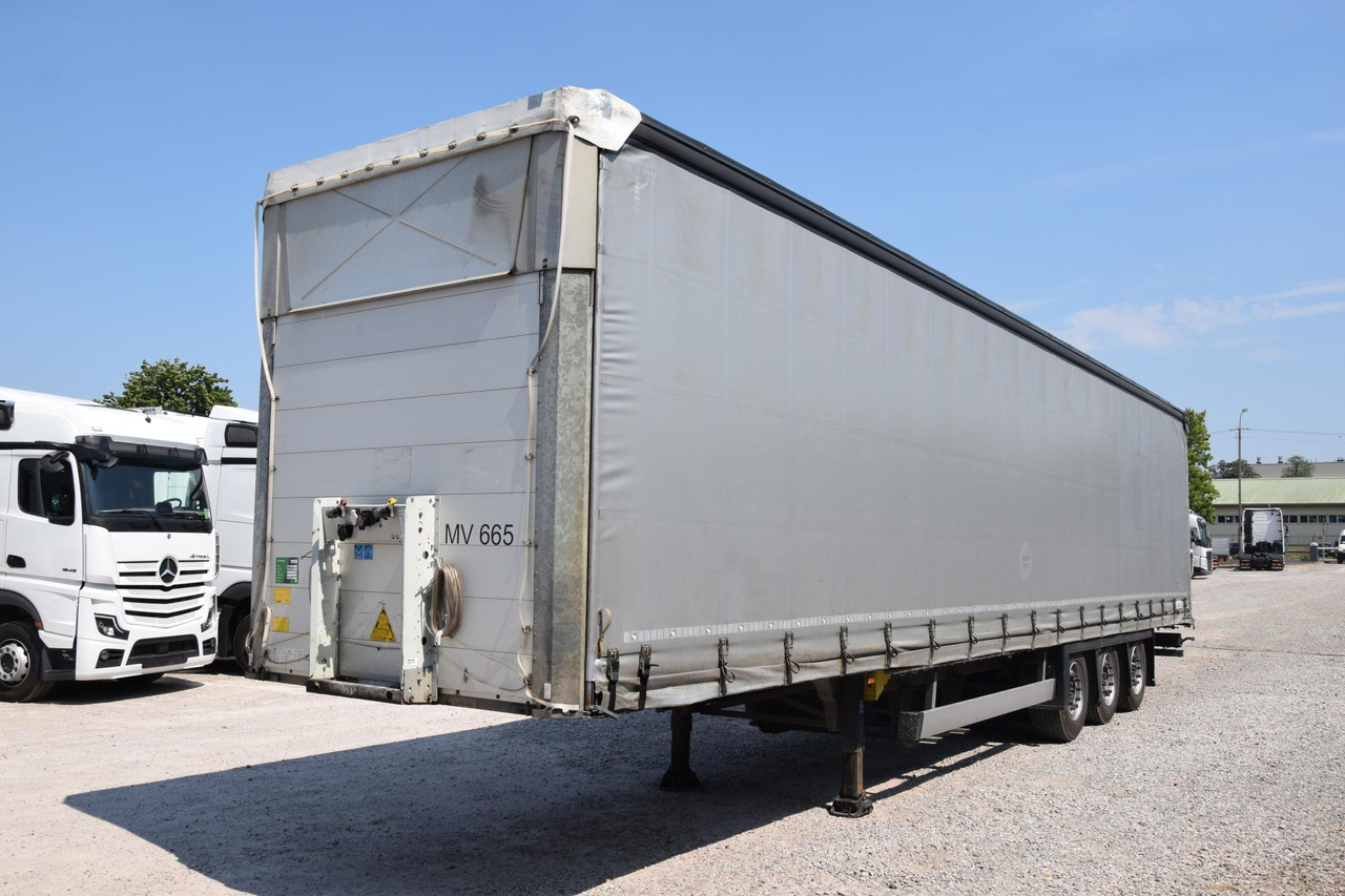 Schmitz Cargobull SCS24/L Varios - Semi-remorque rideaux coulissants: photos 1 Schmitz Cargobull SCS24/L Varios - Semi-remorque rideaux coulissants: photos 1