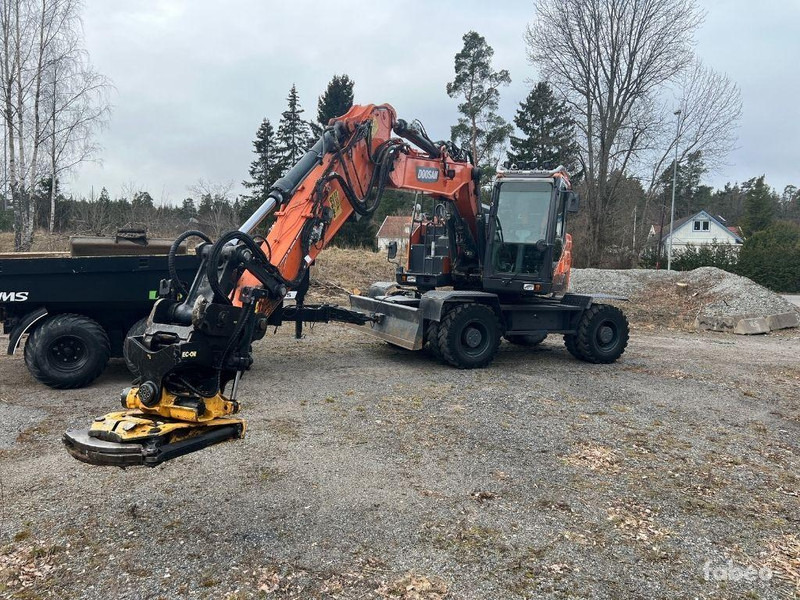 Doosan DX 165W-5 - Pelle sur pneus: photos 1 Doosan DX 165W-5 - Pelle sur pneus: photos 1