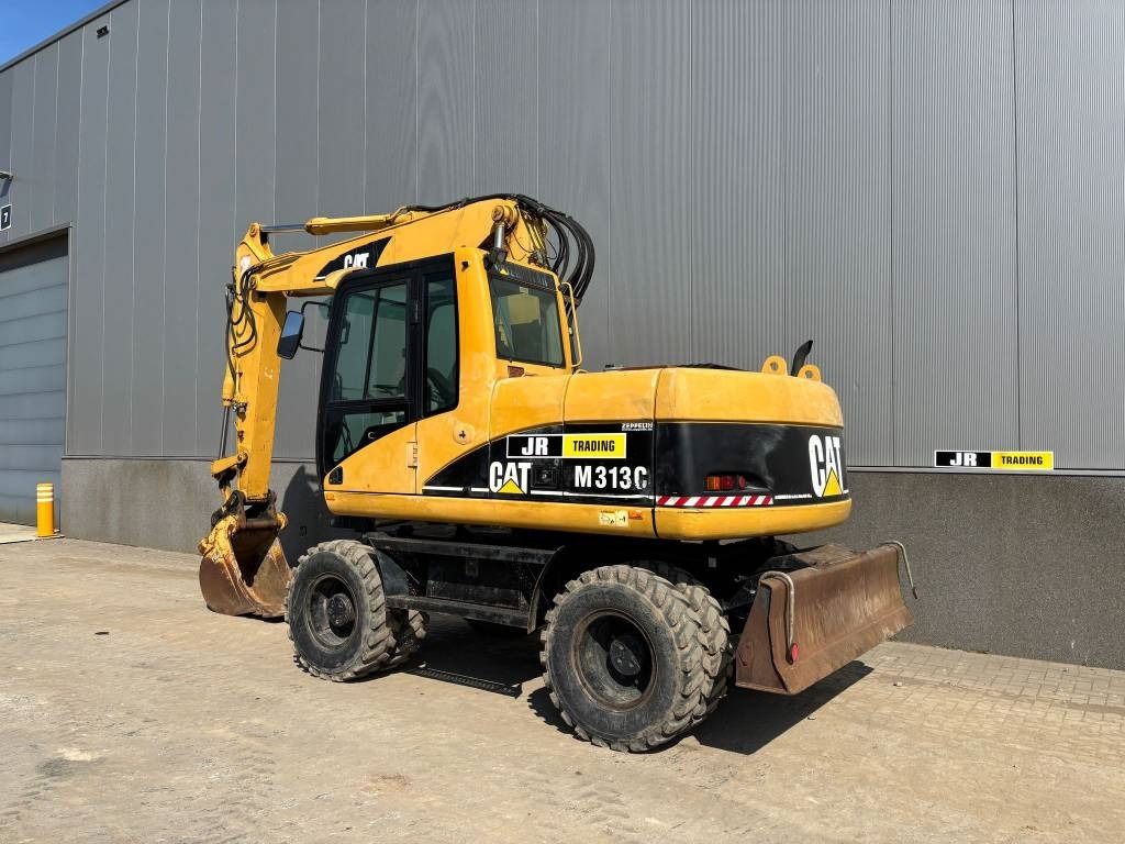 CAT M 313 C (Low verified hours) - Pelle sur pneus: photos 3 CAT M 313 C (Low verified hours) - Pelle sur pneus: photos 3