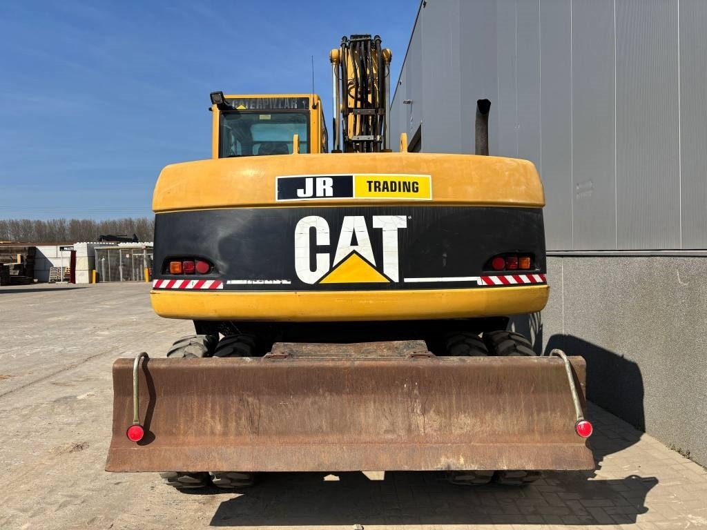 CAT M 313 C (Low verified hours) - Pelle sur pneus: photos 4 CAT M 313 C (Low verified hours) - Pelle sur pneus: photos 4