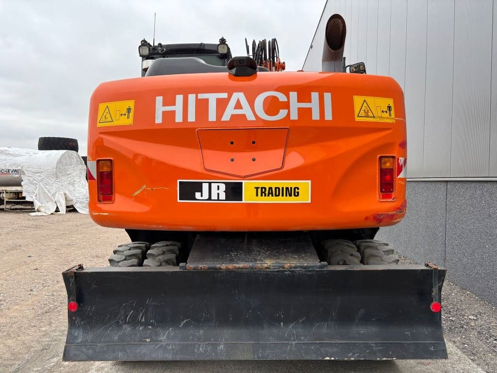 Hitachi ZX 140 W-5B - Pelle sur pneus: photos 4 Hitachi ZX 140 W-5B - Pelle sur pneus: photos 4