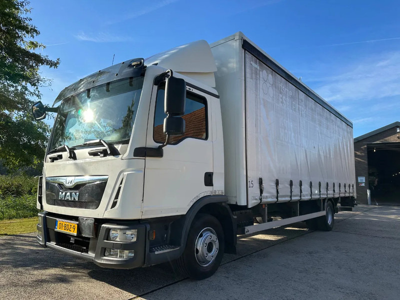 MAN TGL 12.220 / EURO6 / NL TRUCK / AUTOMATIC / CURTAINSIDE - Camion à rideaux coulissants: photos 1 MAN TGL 12.220 / EURO6 / NL TRUCK / AUTOMATIC / CURTAINSIDE - Camion à rideaux coulissants: photos 1