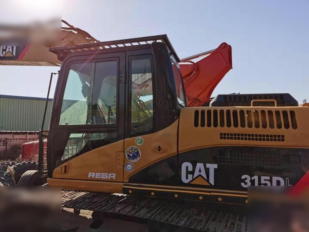 CATERPILLAR 315DL - Pelle sur chenille: photos 4 CATERPILLAR 315DL - Pelle sur chenille: photos 4