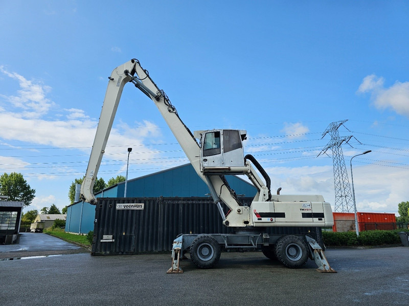 Terex TM350 - Pelle de manutention: photos 1 Terex TM350 - Pelle de manutention: photos 1