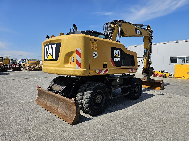 CATERPILLAR M318F - Pelle sur pneus: photos 4 CATERPILLAR M318F - Pelle sur pneus: photos 4