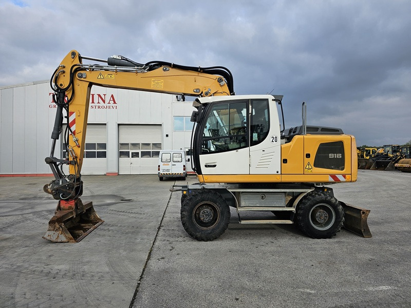 LIEBHERR A916 - Pelle sur pneus: photos 1 LIEBHERR A916 - Pelle sur pneus: photos 1