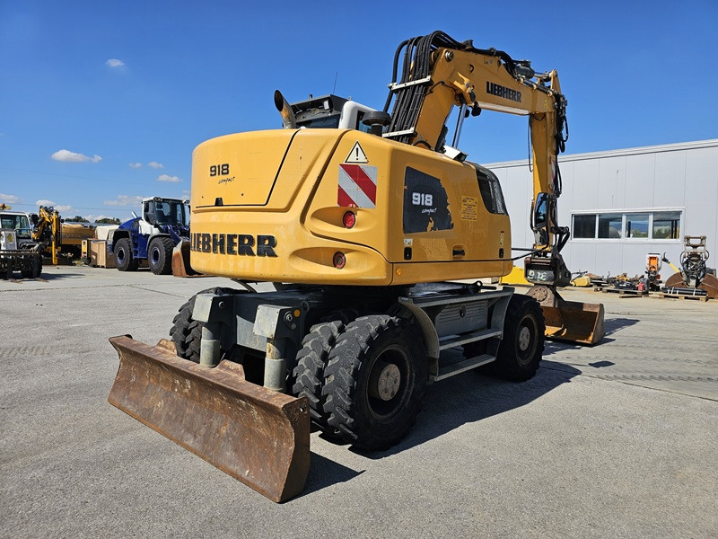 LIEBHERR A918 Compact - Pelle sur pneus: photos 3 LIEBHERR A918 Compact - Pelle sur pneus: photos 3