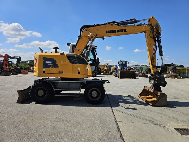 LIEBHERR A918 Compact - Pelle sur pneus: photos 4 LIEBHERR A918 Compact - Pelle sur pneus: photos 4