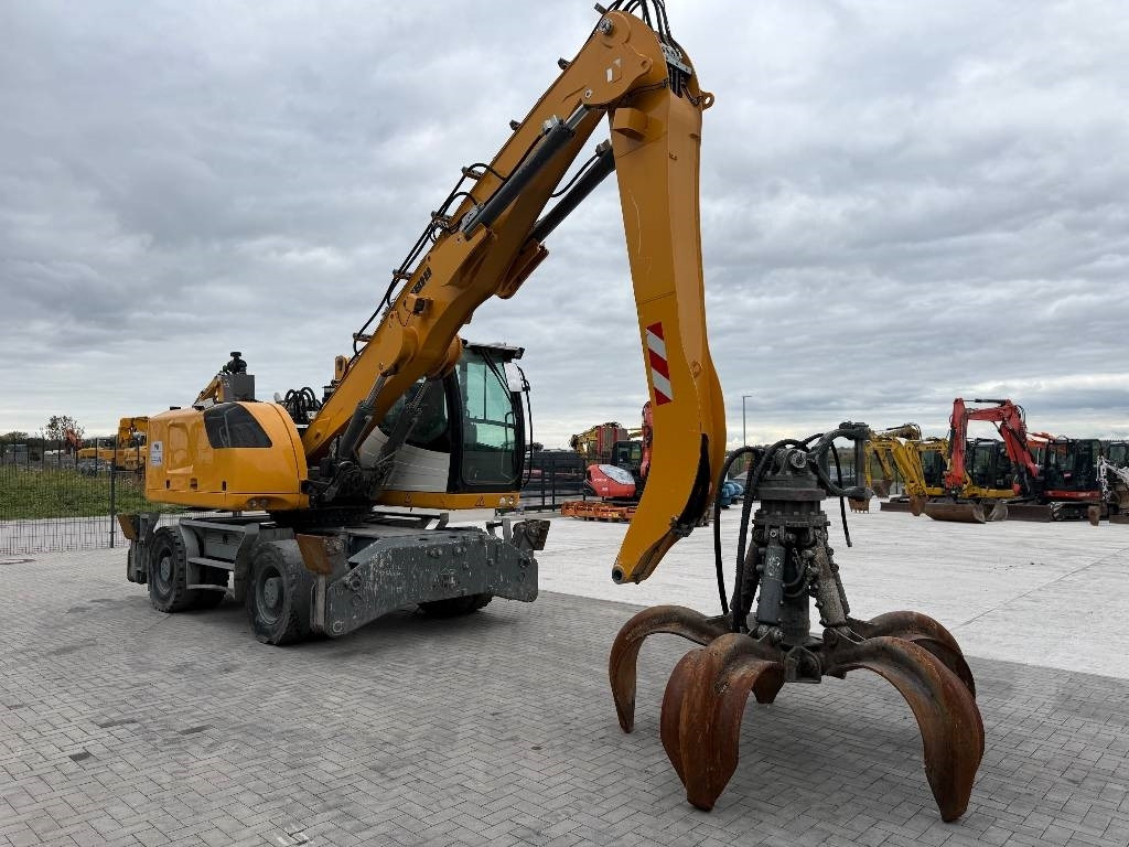 Pelle de manutention Liebherr LH 22: photos 7